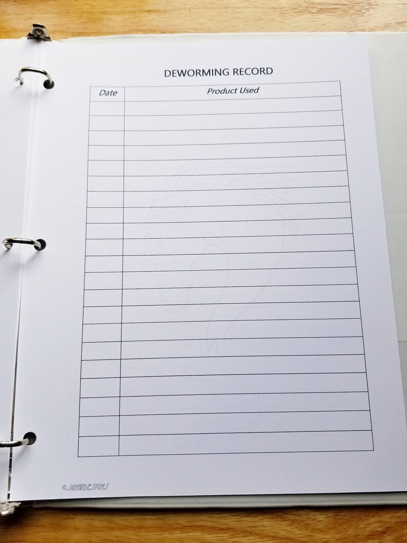 May include: A white binder with a black title "Deworming Record" and columns labelled "Date" and "Product Used".