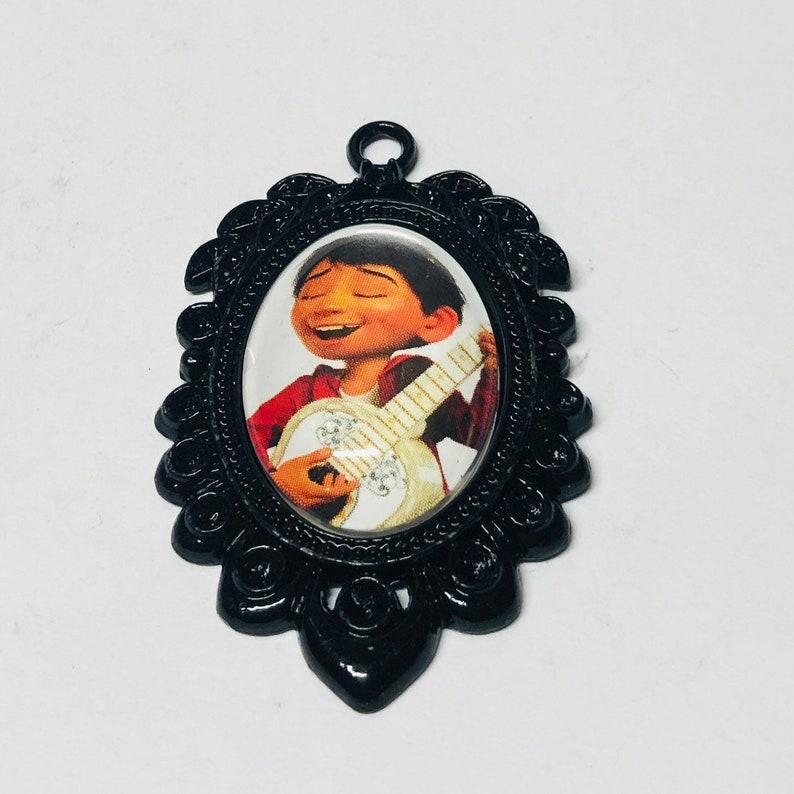 Disney Pixar Coco Storybook Jewelry Miguel Small Oval Cameo Brooch Keychain or Necklace