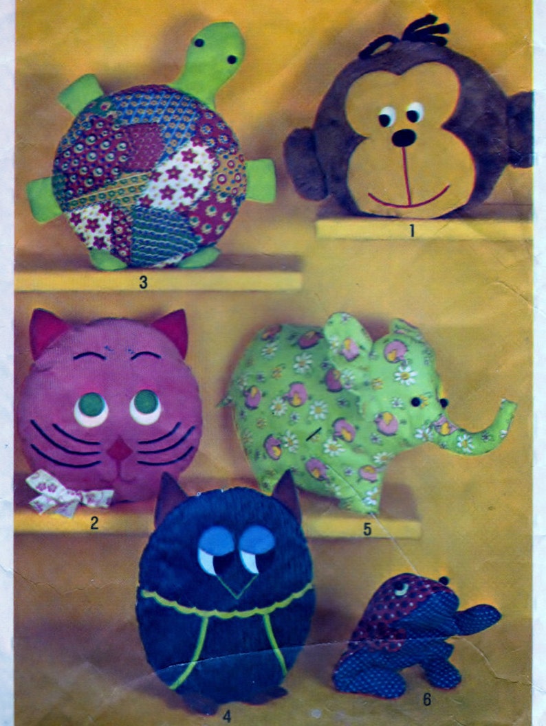 Simplicity 9740 Pattern Pillow-Toys And Pajama Bags: Monkey, Cat, Turtle, Owl, Elephant, And Frog image 1