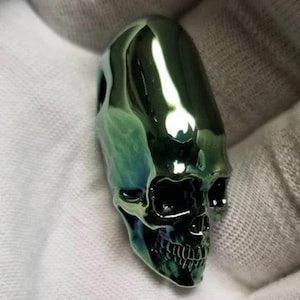 Glass Elongated Skull Pendant Paracas Style Fumed in 24k Gold