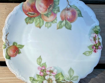 Vintage plate with apples and blossoms