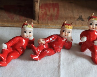 Set of 3 Vintage Red Devils 2 Reclining 1 Kneeling Blonde Hair Imps Made In Japan