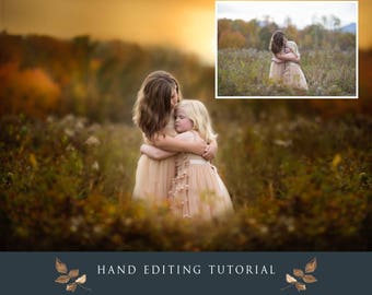 May include: Two young sisters in beige dresses hug each other in a field of tall grass. The background is blurred and the setting sun casts a warm glow over the scene. The text "Sister sister..." is written in a cursive font at the top of the image.