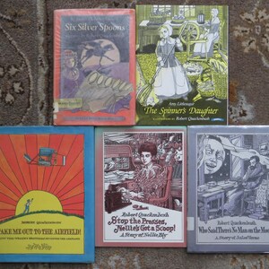 May include: Five vintage children's books with colorful covers. Titles include "Six Silver Spoons," "The Spinner's Daughter," "Take Me Out to the Airfield!," "Stop the Presses, Nellie's Got a Scoop!," and "Who Said There's No Man on the Moon?"