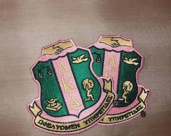 AKA toppa scudo, toppe, 1908, toppa rosa e verde, una toppa per ordine