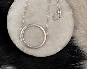 Silver Circle necklace, hand formed fine silver shape connected to a 17 inch sterling chain