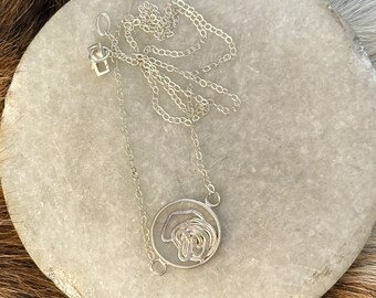 Rosa necklace round sterling silver circle with sterling silver metal abstract rose in the center on delicate cable chain 18” length