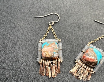 The "Carmine" earring: spiny oyster copper turquoise composit stone, frosted grey glass cube beads with hammered silver fringe