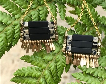 The "Carmine" earring: matte onyx, Dalmatian jasper and gold chain, earwire, hand forged fringe.