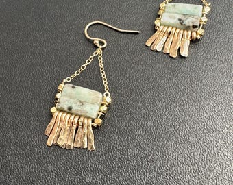 The kiwi jasper stone and brass faceted bead "Carmine" earring has irregular length handforged gold fringe, gold chain and gold earwire