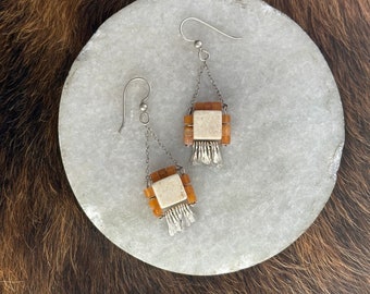 The "Carmine" earring: white riverstone, orange colored carnelian cube beads with hammered silver fringe