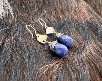 The "Josie" earring, handcut and refined silver diamond shape, a blue soladite briolette shaped bead and a sterling silver hook