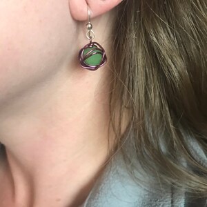 Leesa earring: bright green glass bead with purple colored wire and sterling silver earwire image 4