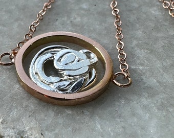 Rosa necklace round 14k rose gold circle with silver metal abstract rose in the center on delicate cable chain 17” length