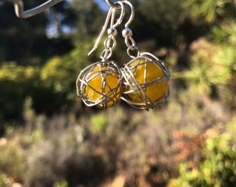 Leesa earring: Recycled yellow glass bead wrapped with silver plated wire and sterling silver earwire