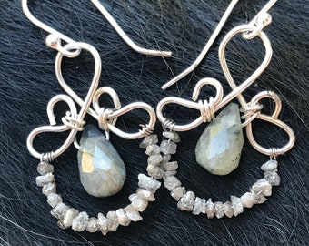 The Emma earring: hand formed sterling silver wire with a labradorite teardrop bead and a string of rough shaped diamond beads