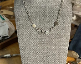 Alicia link necklace with five different sized circles