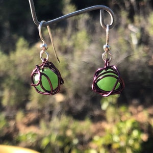 Leesa earring: bright green glass bead with purple colored wire and sterling silver earwire image 3