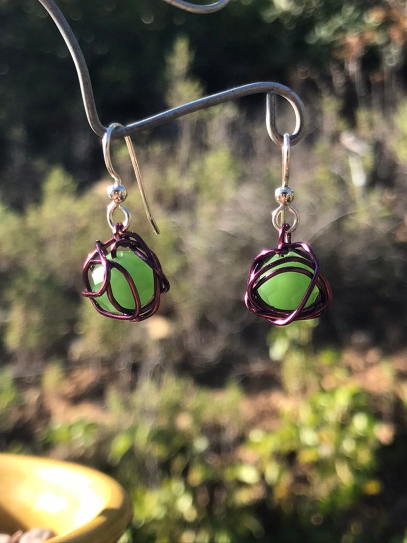 Leesa earring: bright green glass bead with purple colored wire and sterling silver earwire image 3