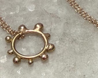 Sculpted bubble and ball accented Circle necklace on 20 inch chain 14k yellow gold