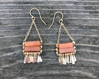 Orange carnelian and brass faceted bead "Carmine" earring has irregular length handforged gold-fill wire fringe, gold chain and gold earwire