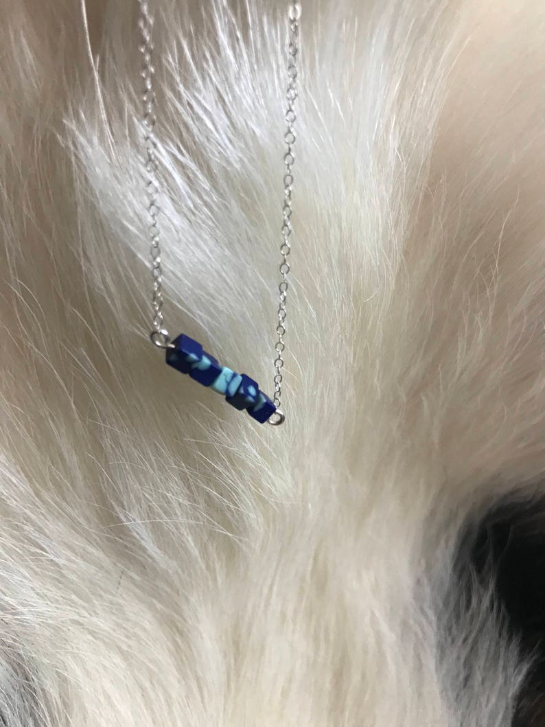 The Candace necklace is delicate and short made of silver chain necklace with five 3mm sized cube recon azurite beads 18 inch length chain