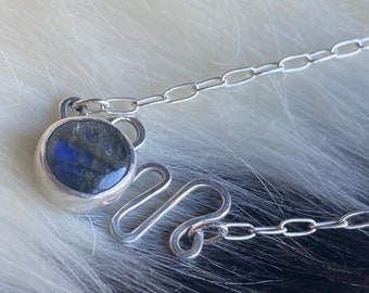 Marlee necklace a sterling silver necklace with labradorite stone set on a squiggle design