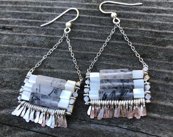 The "Carmine" earring: black rutilated quartz and mother of pearl with silver chain, earwire, hand forged fringe.