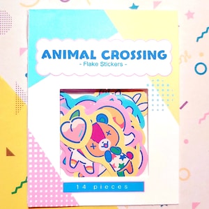 Peut inclure: Une feuille de 14 autocollants de personnages d'Animal Crossing colorés. Les autocollants sont sur un fond blanc avec une bordure bleue et le texte "Animal Crossing - Flake Stickers -" et "14 pièces".