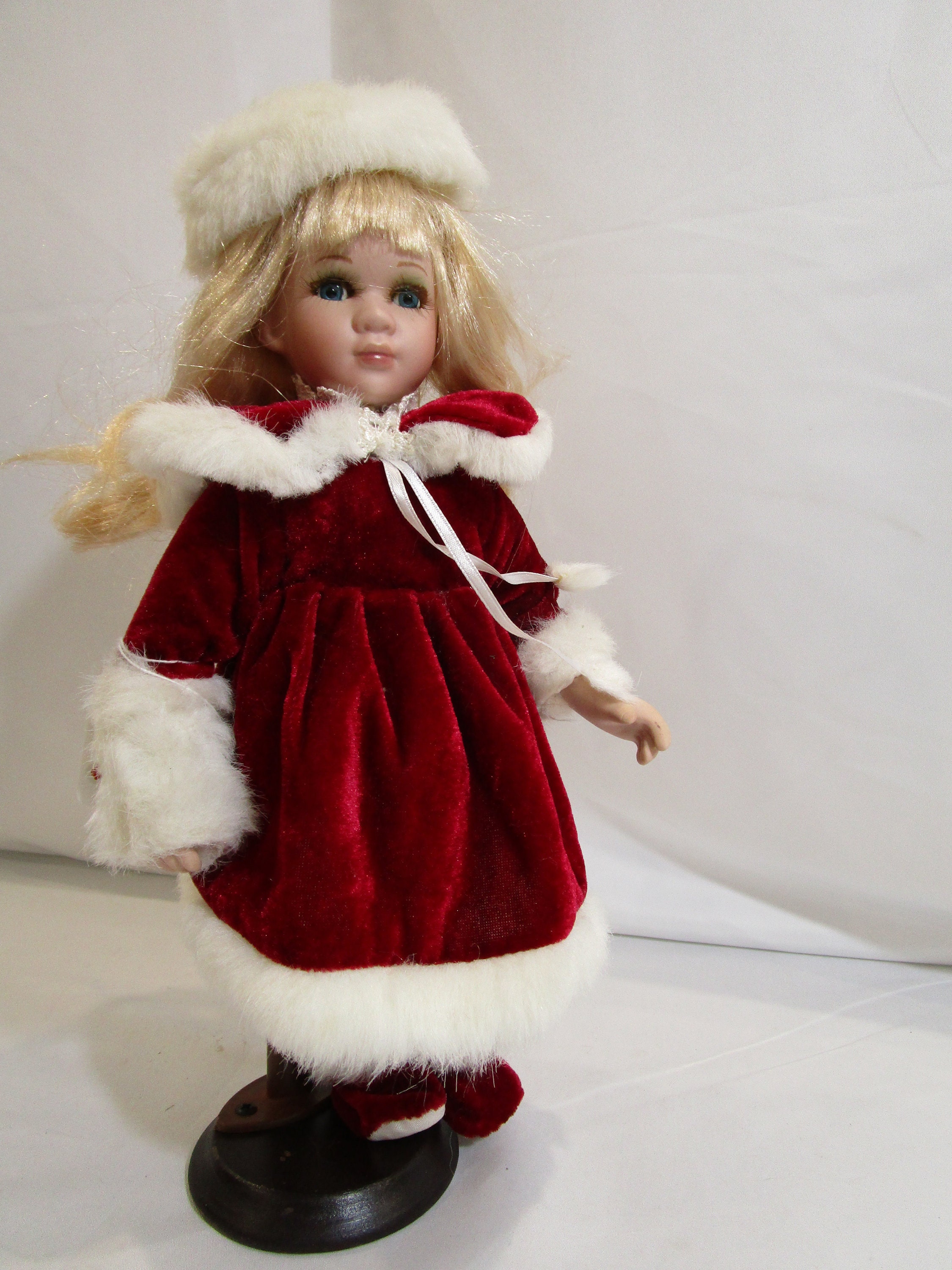 Porcelain doll red velvet dress clearance