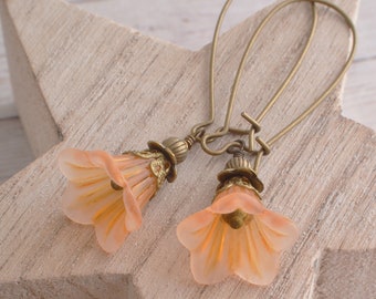 Orange flower earrings lucite flower with bronze tone findings dangly flowers