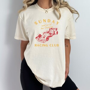 sunday racing club meet me at the paddock f1 tee | ivory comfort colors style shirt | cute formula 1 racing inspired aesthetic modern tshirt