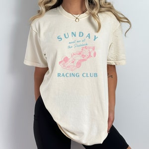 sunday racing club meet me at the paddock f1 tee | ivory comfort colors style shirt | cute formula 1 racing inspired aesthetic modern tshirt