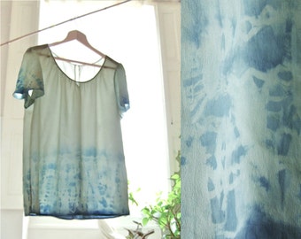 Tie dyed silk top hand dyed in tones of blue with natural dye, a sustainable boho chic upcycled blouse from France, size M