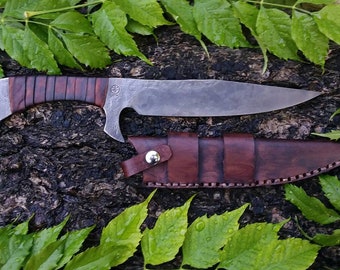 Integral guarded field knife and sheath