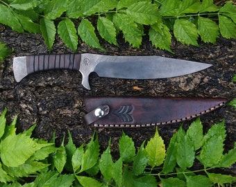 Integral guarded field knife and sheath