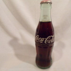 Vintage Coca Cola Classic Bottle FULL Unopened with Red Bottle Cap