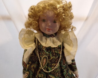 Vintage Porcelain Doll with Pearl Necklace