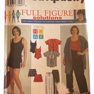 May include: Simplicity sewing pattern 8772 for full figure solutions. The pattern features various clothing designs, including a swimsuit, tops, and pants. The package includes the text "THE HOAX SYSTEM TO FLATTER YOUR BODY TYPE" and "by Mary Duff".