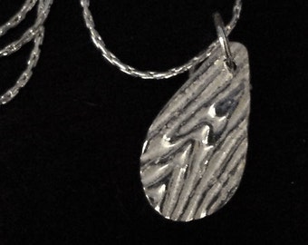 Woodgrain Texture Silver Teardrop Charm -- Handmade, Embossed Pure Silver Pendant Necklace