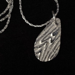 Woodgrain Texture Silver Teardrop Charm -- Handmade, Embossed Pure Silver Pendant Necklace