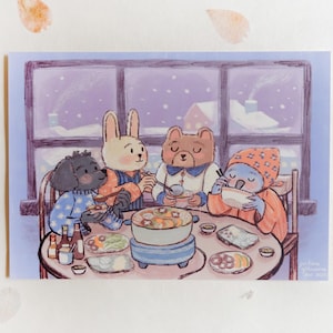May include: A digital illustration of four anthropomorphic animals sitting around a round table eating a meal from a central pot. The scene is set indoors with a large window showing a snowy landscape. The characters are wearing colorful clothing.