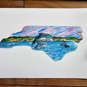 État de Caroline du Nord carte muette impression coucher de soleil lever du soleil la plage des Outer Banks océan vagues dauphins peinture aquarelle parc national