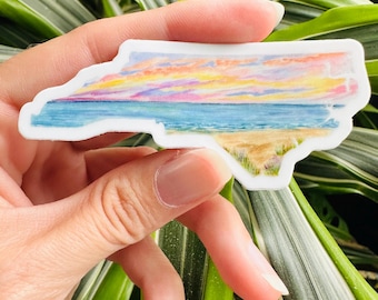 Aquarel bumpersticker North Carolina: sticker Outer Banks Sunset Beach, grappige illustratie