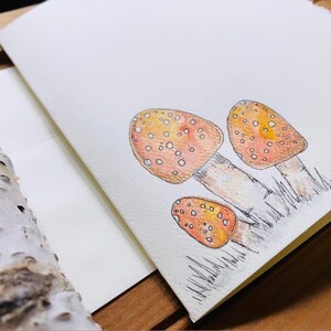 Cartão de desenho aquarela original pintado à mão, único, vermelho, laranja, cogumelos, natureza, cartão de felicitações em branco