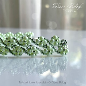 Right angle weave beading pattern, beaded bracelet tutorial, easy beading tutorial flower bracelet beading pattern, double row flower bracelet beadin tutorial, double flower bracelet bead pattern