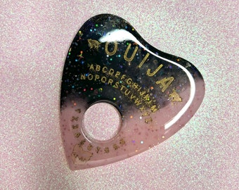 Planchette en résine rose et noire