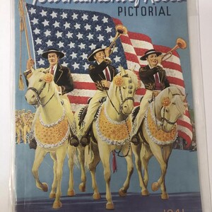 May include: A vintage book cover featuring a colorful illustration of three men on horseback in a parade. The men are wearing traditional costumes and playing trumpets. The American flag is in the background. The text on the cover reads "Pasadena Tournament of Roses Pictorial America in Flowers - 1941".