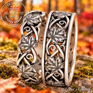 Könnte beinhalten: Zwei Ringe aus Sterlingsilber mit einem komplizierten durchbrochenen Design aus verschlungenen Ranken und detaillierten Ahornblättern. Ein kreisförmiges Emblem oben links zeigt Genuine Sterling 925 Silver hand crafted nickel free made in the USA.