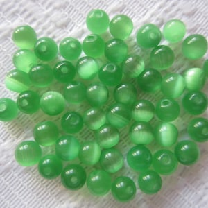 25  Shamrock Irish Green Cats Eye Fiber Optic Glass Beads  6mm
